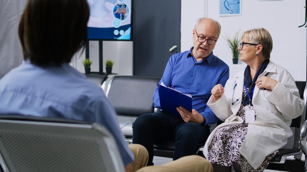 Guidance and Support in Adult IOP Medical professional assisting a patient in IOP setting